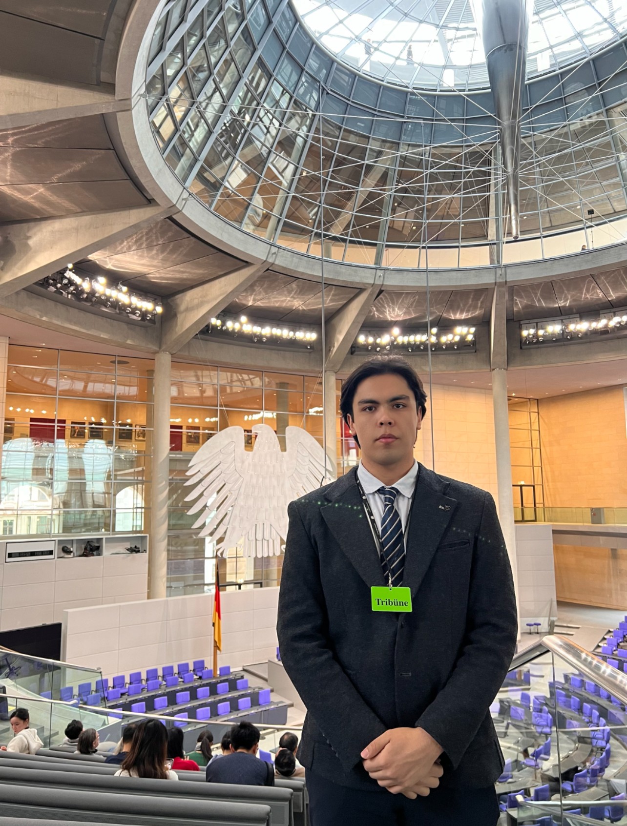 Ulugbek Kodirov overlooking the German Bundestag chamber in the Reichstag building.